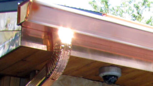A picture of gutters and downspouts